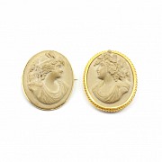 Pair of cameos set in 18k yellow gold.