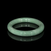 Carved green jadeite bangle, 20th century