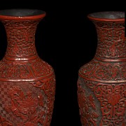 Pair of red lacquer vases, 20th century