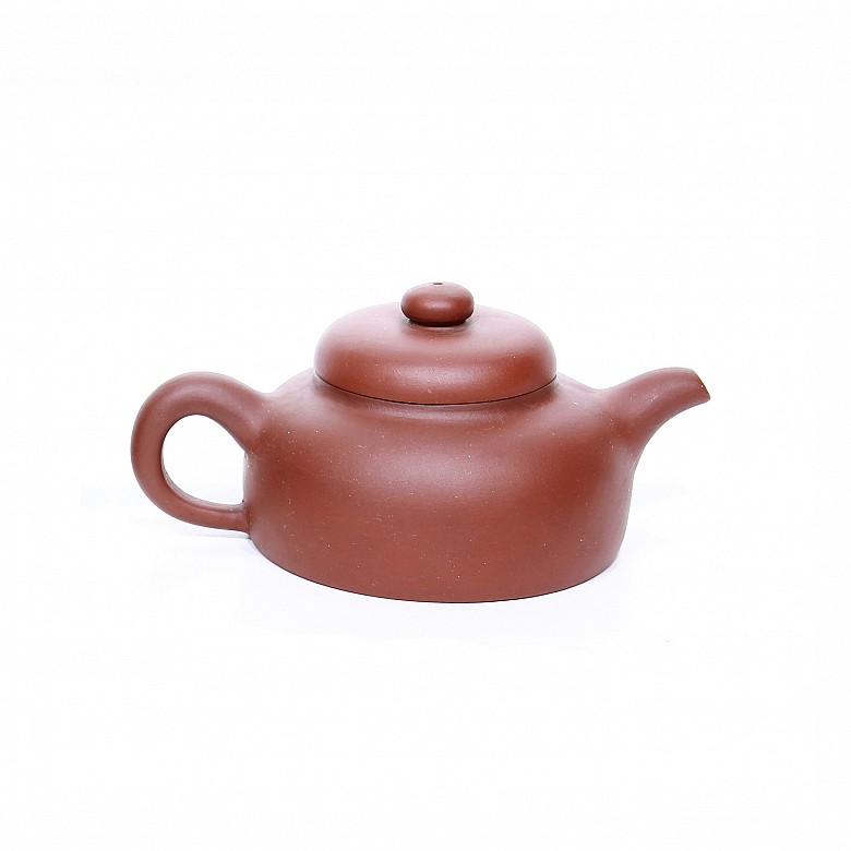 Clay Yixing teapot.