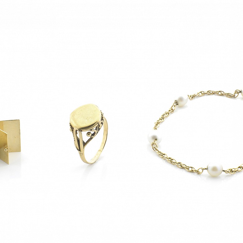 Three-piece set in 18k yellow gold