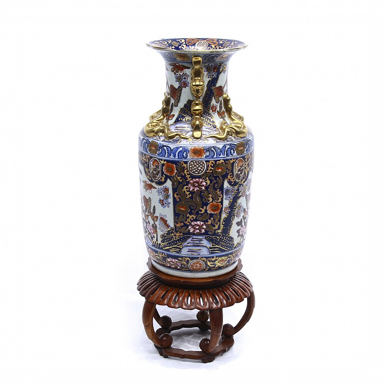 Enameled porcelain vase with golden details, 20th century