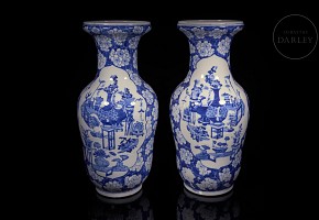 Pair of blue and white ‘Scenes and Plum Blossom’ vases, Qing Dynasty