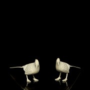 Pair of carved ivory birds, early 20th century.