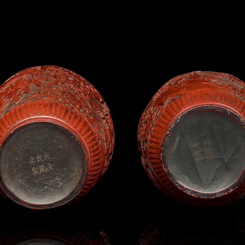 Pair of red lacquer vases, 20th century