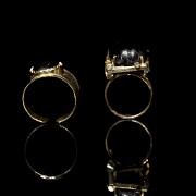 Two rings in yellow gold and black stones