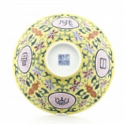 A famille rose yellow-ground bowl, Qianlong seal mark.