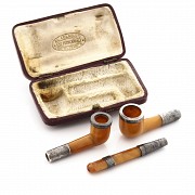 Set of two pipes and a mouthpiece of amber and silver, 19th century