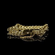 Bracelet with four chains in yellow gold