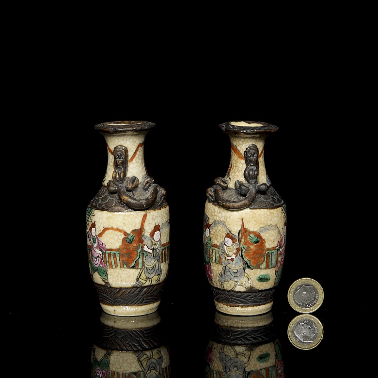 Pair of small Nanking vases, ‘Warriors’, 20th century