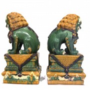 Pair of glazed ceramic lions, 20th century