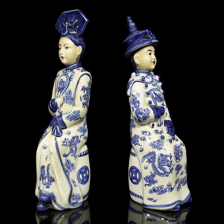 Pair of porcelain civil servants, 20th century