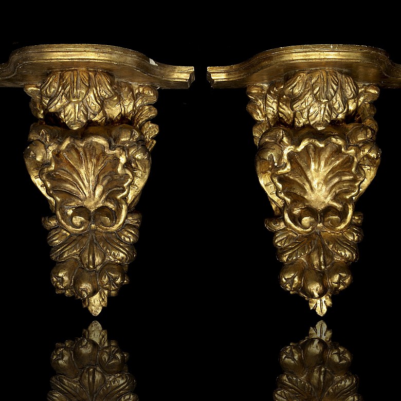 Pair of carved wooden corbels, 19th century