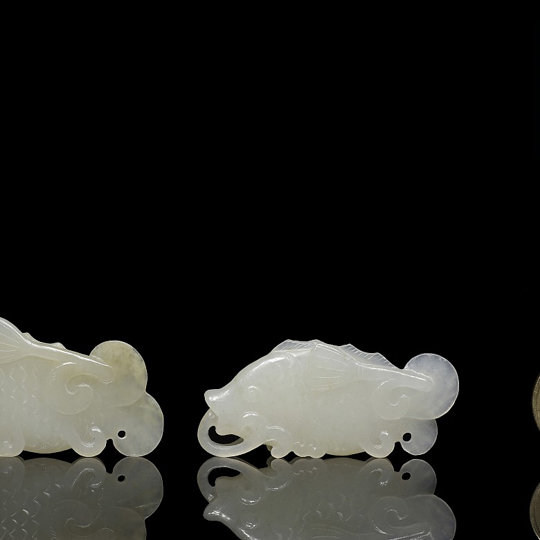 Two white jade fish plaques, 20th century