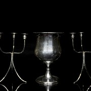 Set of silver-plated metal candlesticks and goblet, 20th century