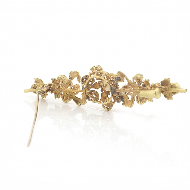 18k yellow gold and zirconia brooch