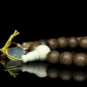 Wooden bead bracelet with jade and tourmaline, Qing dynasty