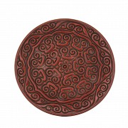 A large carved cinnabar lacquer dish, China, Qing Dynasty.