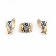 Ring and earrings set with sapphires and diamonds in 18k yellow gold.