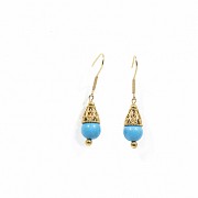 Earrings in 18k yellow gold and turquoise.