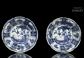 Pair of plates, blue and white, with landscapes, 20th century