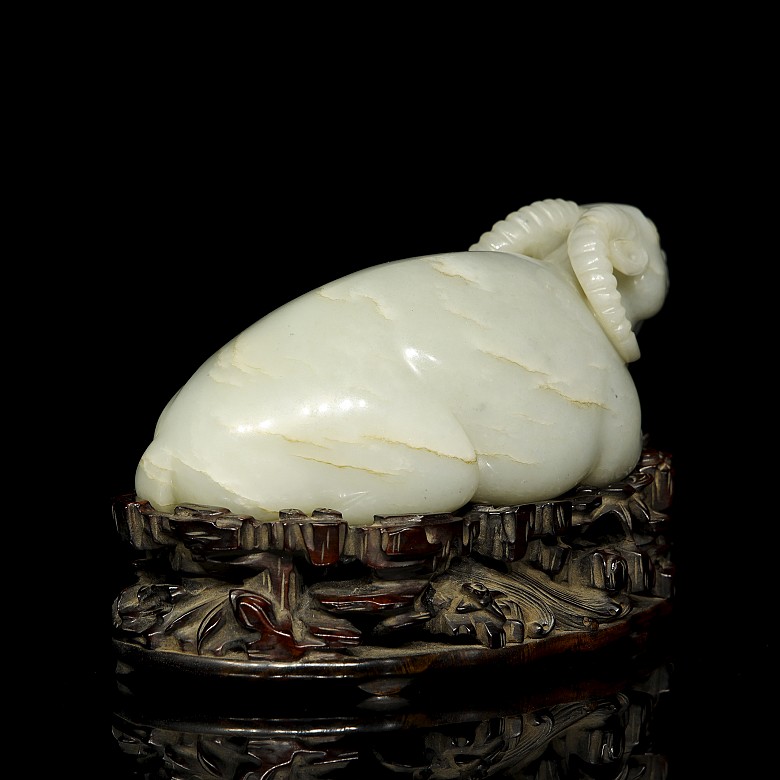 Carved jade figurine “Ram” with wooden base, Qing dynasty