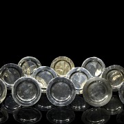 Twelve small silver plates collection